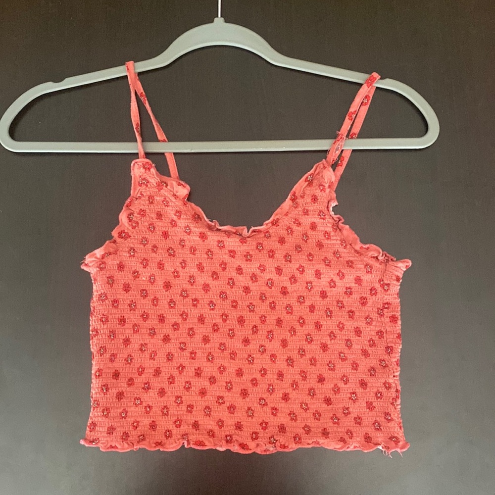 Light reddish floral crop top in size small